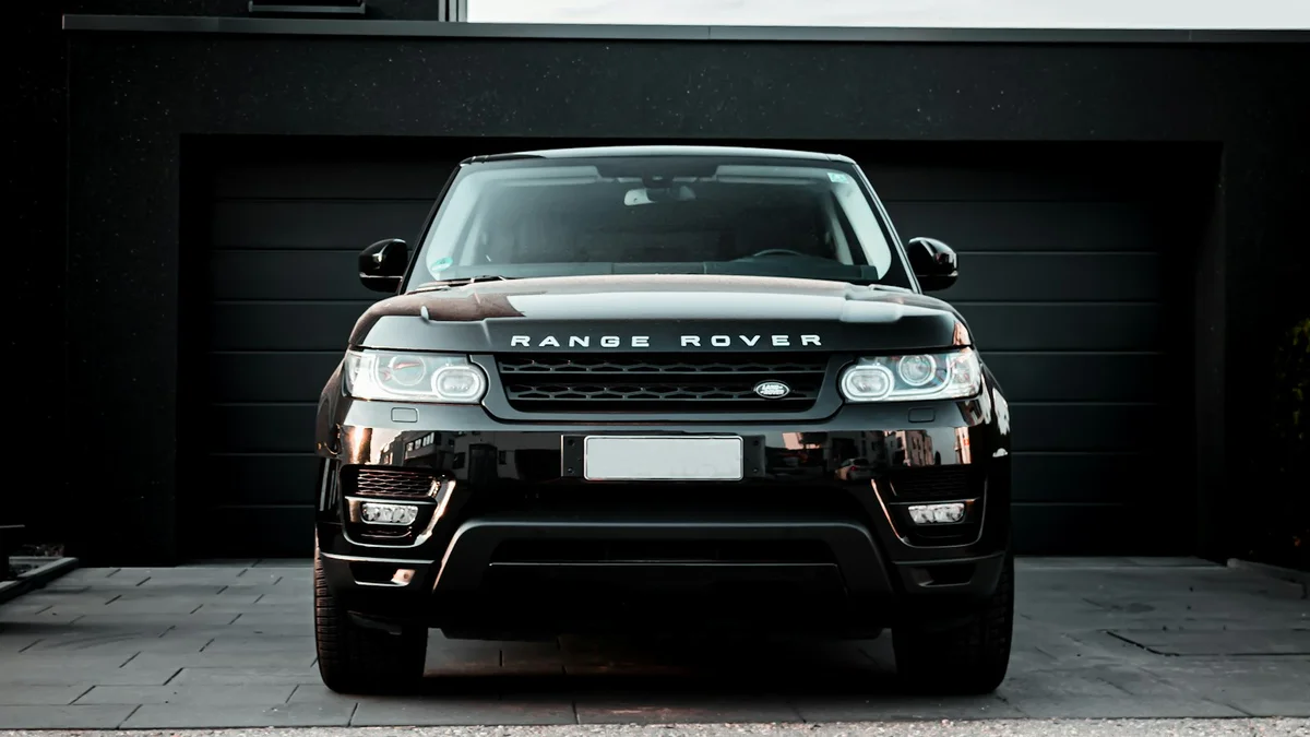 Electric truck charging in modern residential garage with high-power wallbox charger